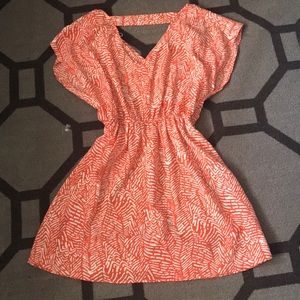 Orange and white print dress